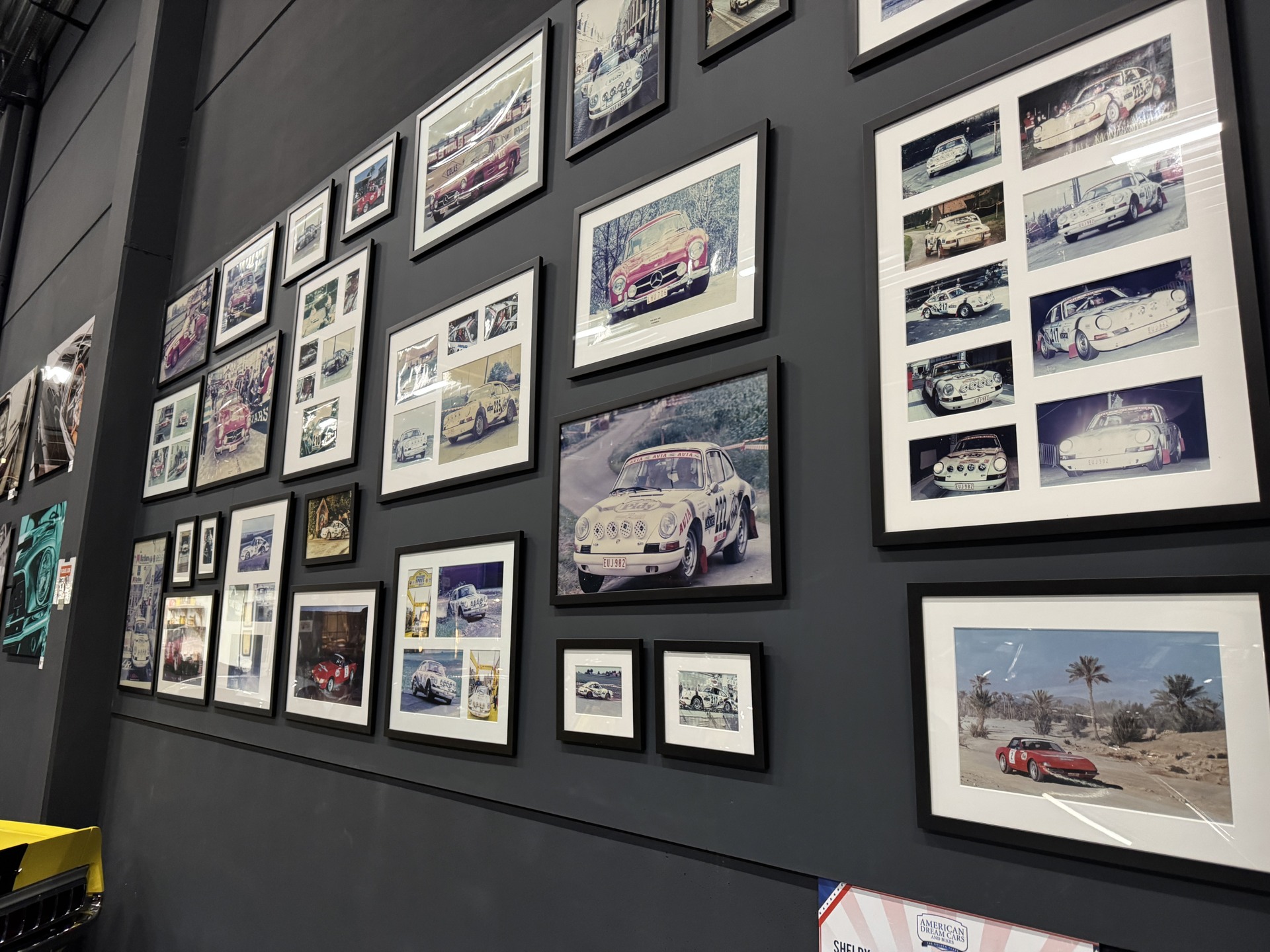 Framed photographs of historic cars and rallies