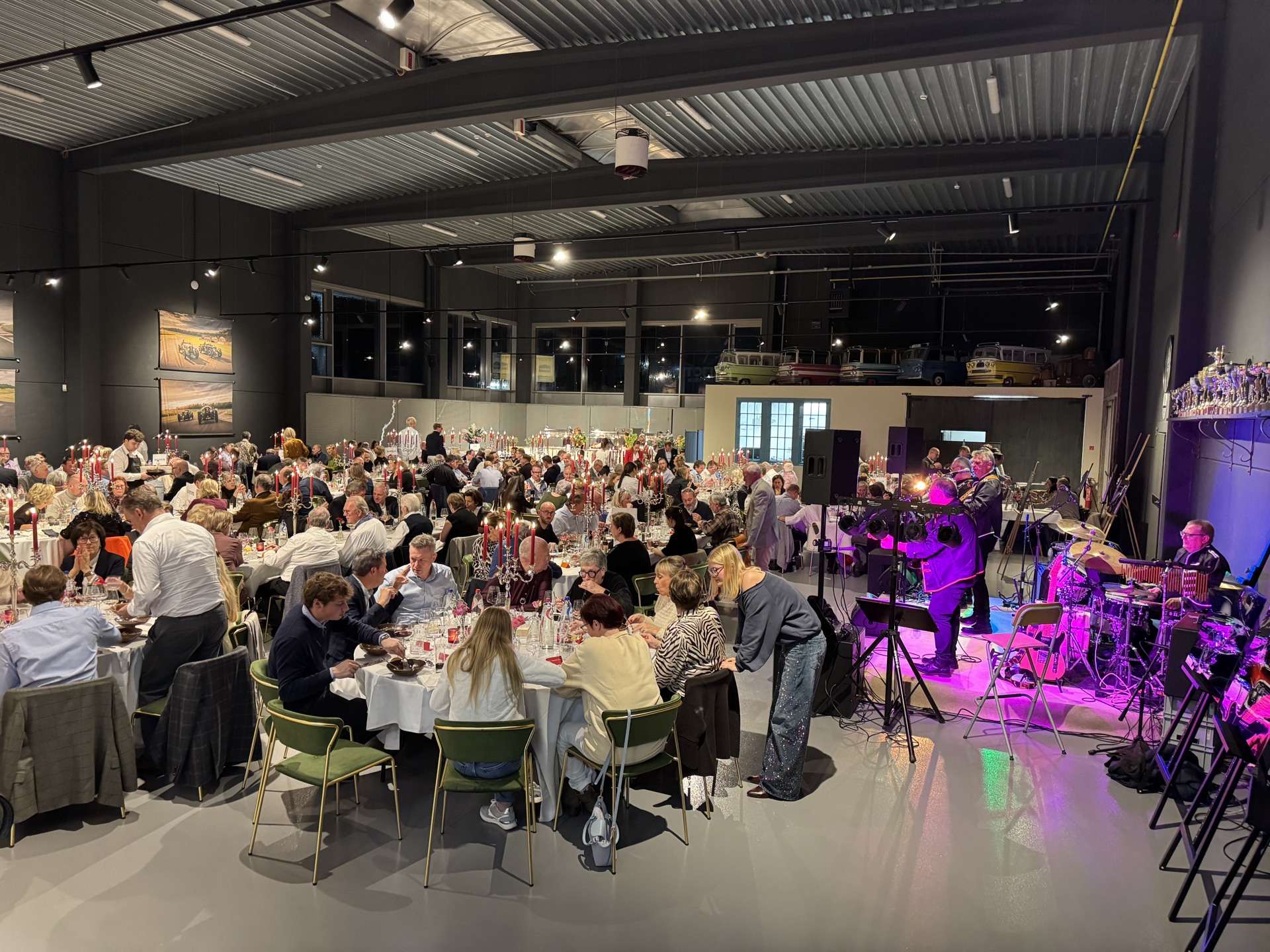 Musicians performing beside the dinner tables
