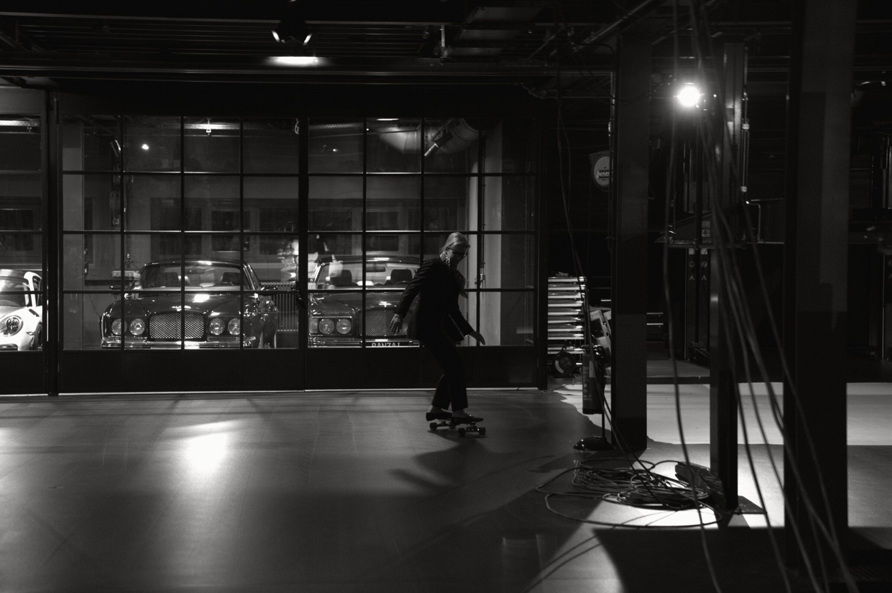 Guest moving through the dark collection space.
