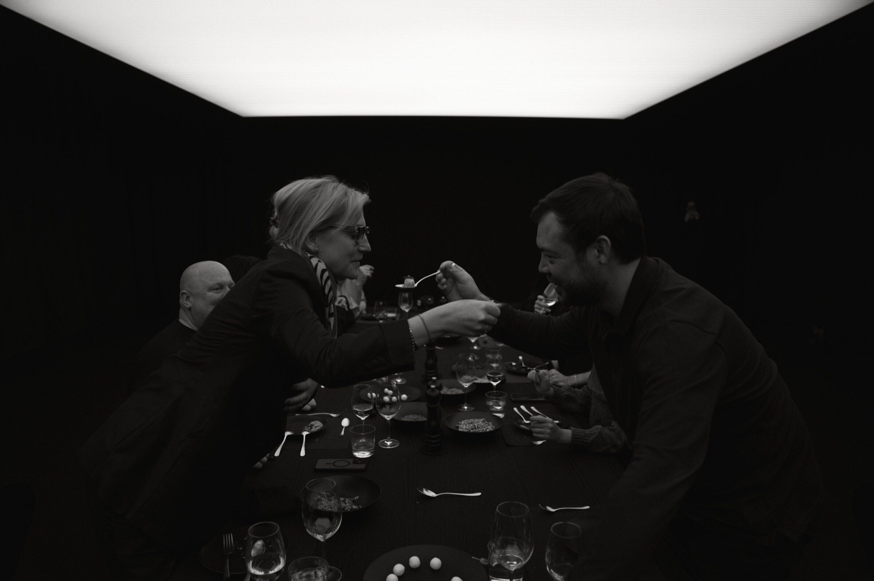 A playful exchange during the light dinner.